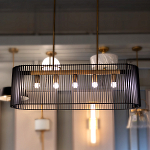 Люстра подвесная овальной формы с металлическим решетчатым абажуром матово-черного цвета и 5 лампами Kichler варинант исполнения - 7 | Loft Concept в Воронеже