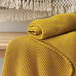 Плед из хлопка жемчужной вязки горчичного цвета Waffle Comfort варинант исполнения - 7 | Loft Concept в Воронеже