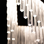 Люстра золотого цвета в форме галочки с каскадом длинных прозрачных трубок Eurofase варинант исполнения - 11 | Loft Concept в Воронеже